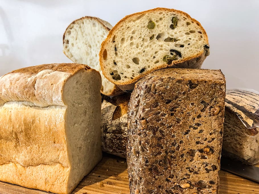Pile of Sliced Wheat Breads, bake, baked, brown, close-up, delicious HD wallpaper