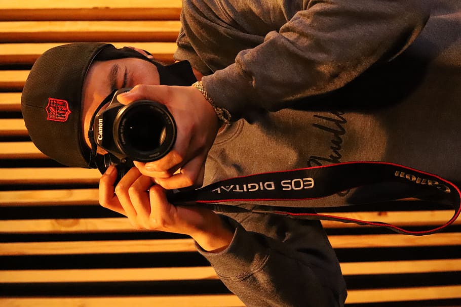 one person, holding, photography themes, real people, camera - photographic equipment HD wallpaper