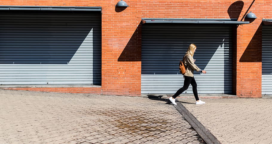 man walking on running bone pavement, architecture, building exterior HD wallpaper