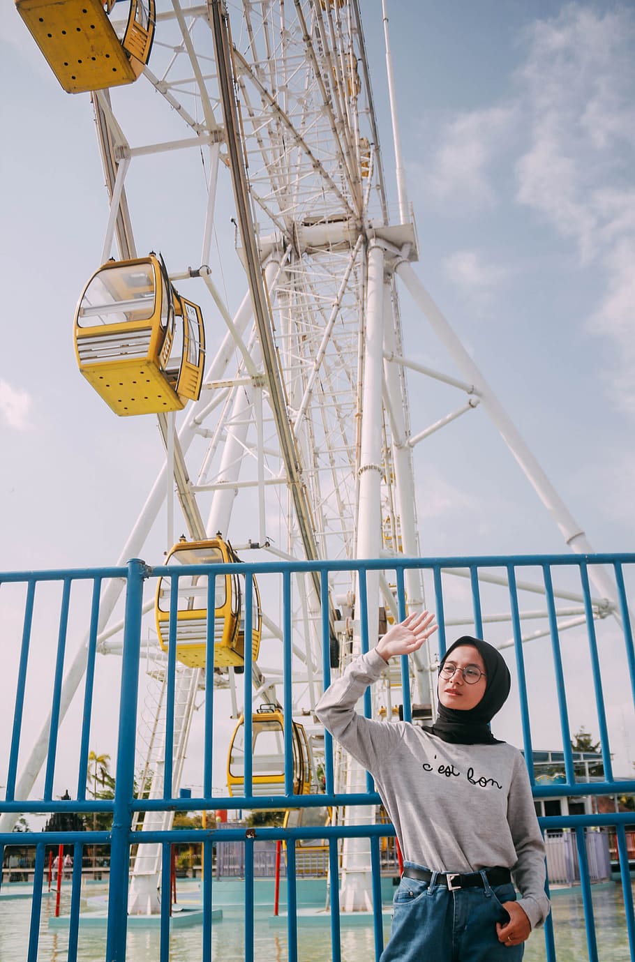 woman standing near Ferris wheel, real people, one person, sky HD wallpaper