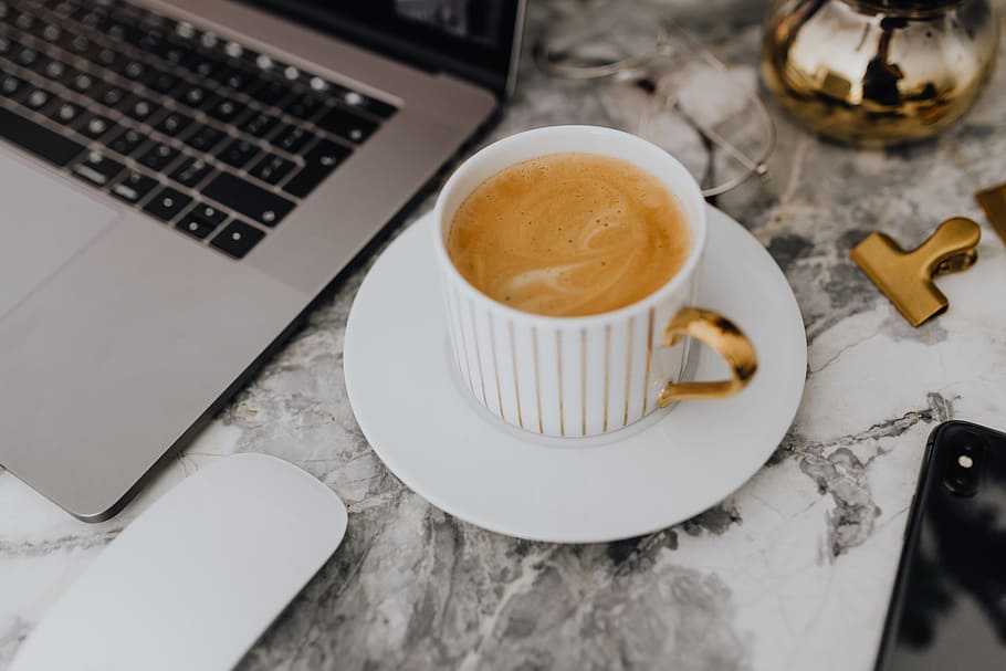 Coffee in a cup on a marble desk, workspace, workplace, cup of coffee HD wallpaper