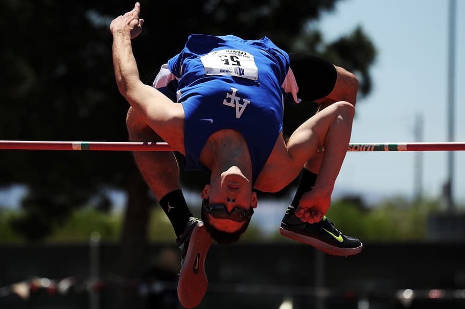 Man Jumping over Red Rod, action, athlete, bar, competition, eyewear HD wallpaper