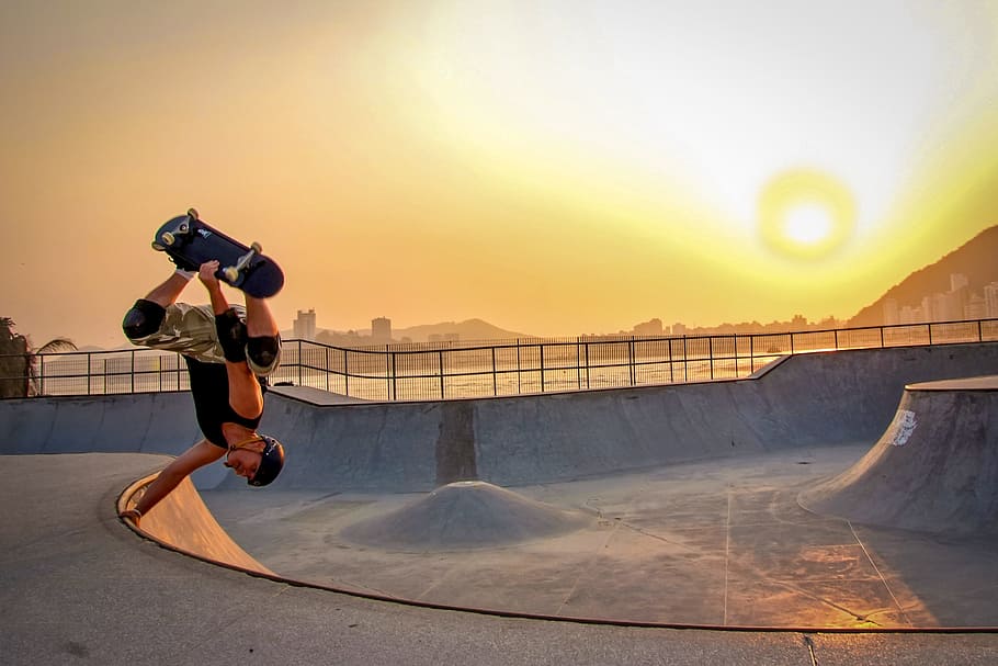 skateboarder, sunset, flip, action, dawn, dusk, sport, man HD wallpaper