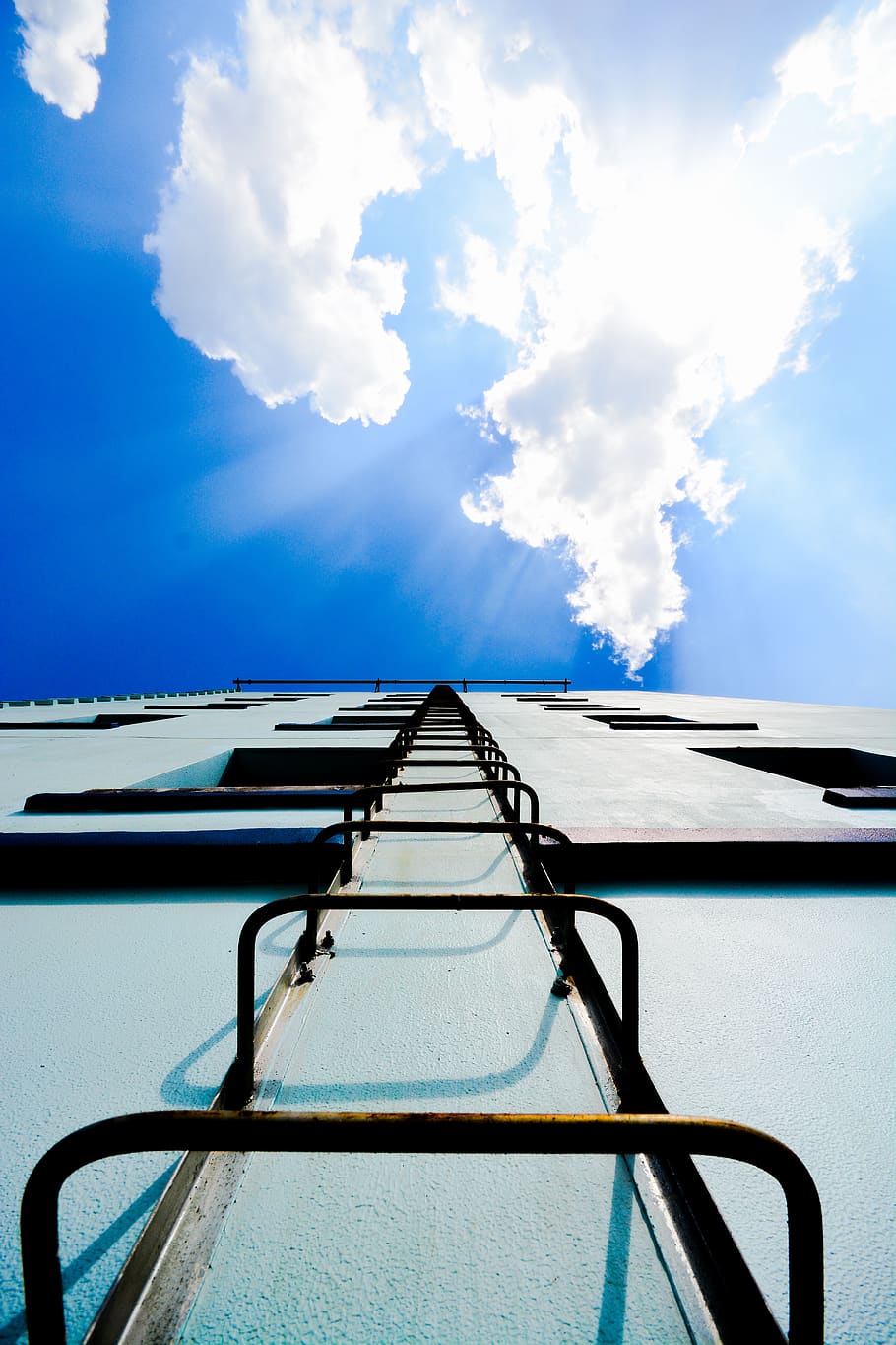 building, sky, clouds, blue sky, ladder, light, sunshine, cloud - sky HD wallpaper