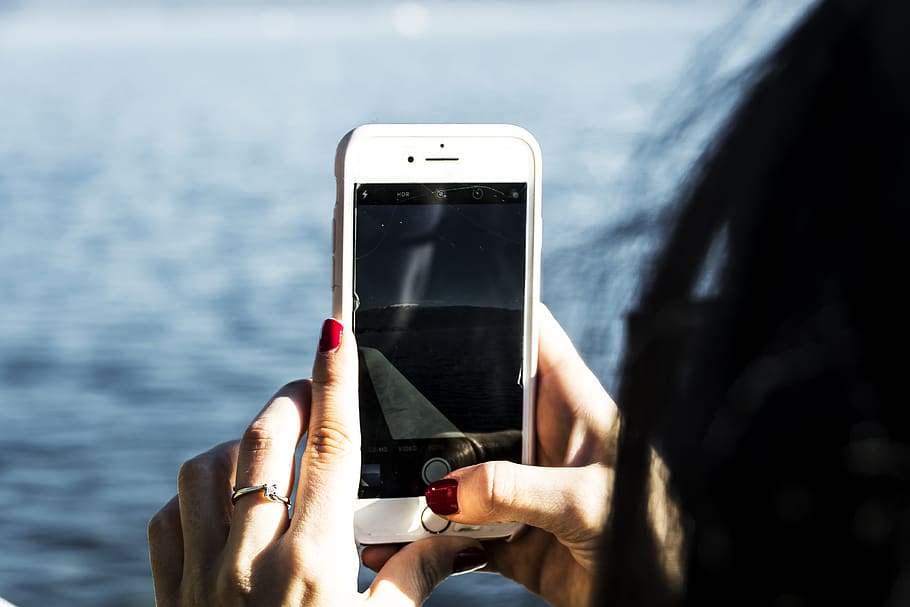 Person Taking Photo Of Body Of Water Using Iphone , smartphone HD wallpaper
