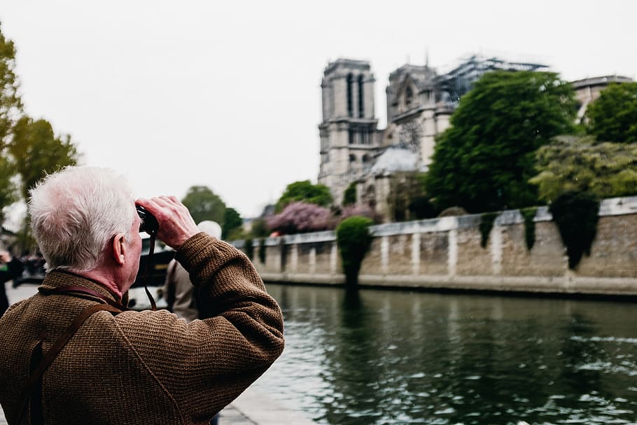 man holding black binoculars, water, architecture, photographing HD wallpaper