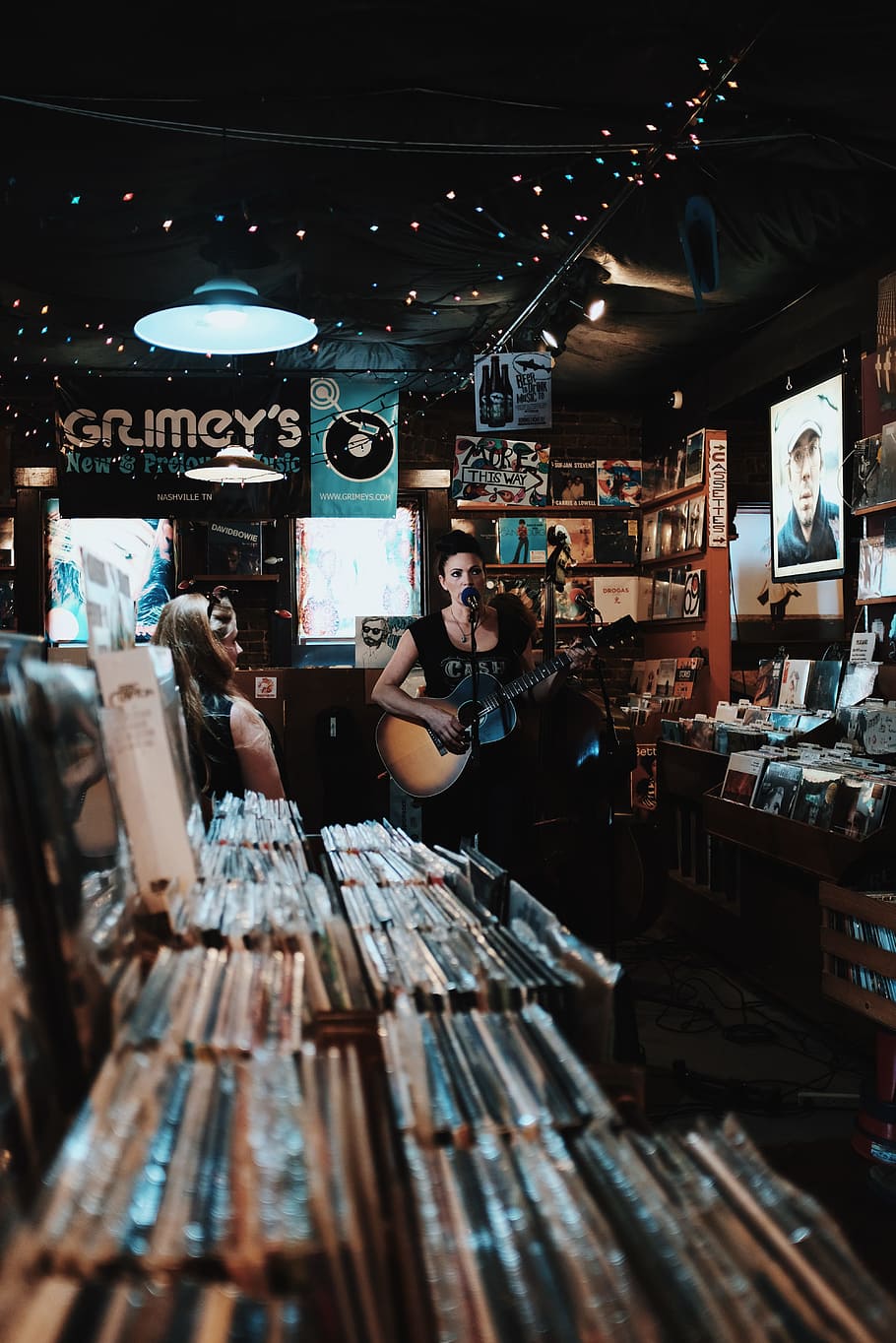 woman sings while playing guitar, shop, interior, music, light HD wallpaper
