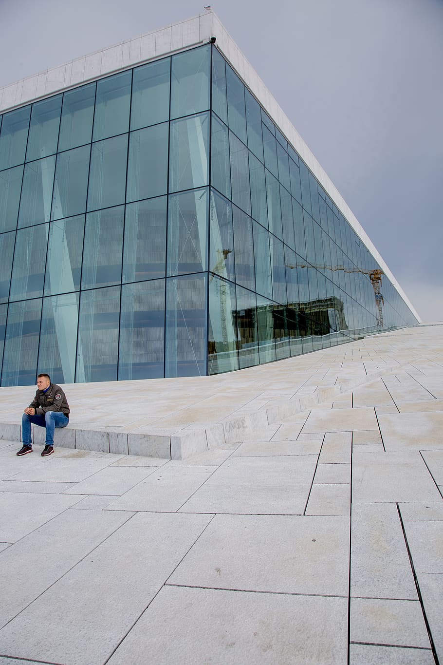 man sitting on building top, office building, footwear, shoe HD wallpaper