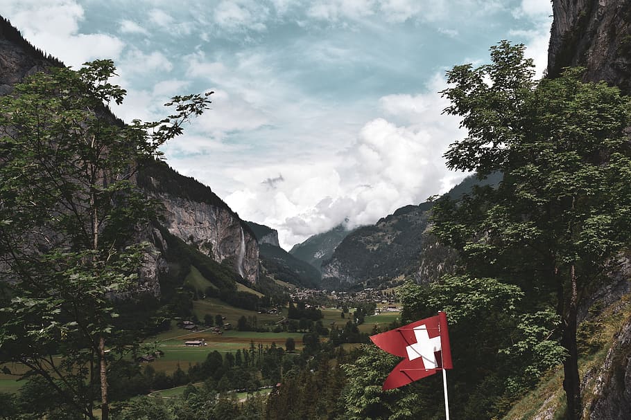 red and white cross flag, tree, mountain, plant, cloud - sky HD wallpaper