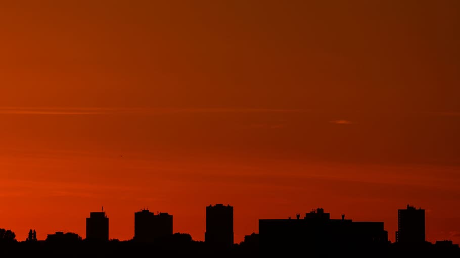 Silhouette of Buildings during Golden Hour, backlit, dark, dawn HD wallpaper
