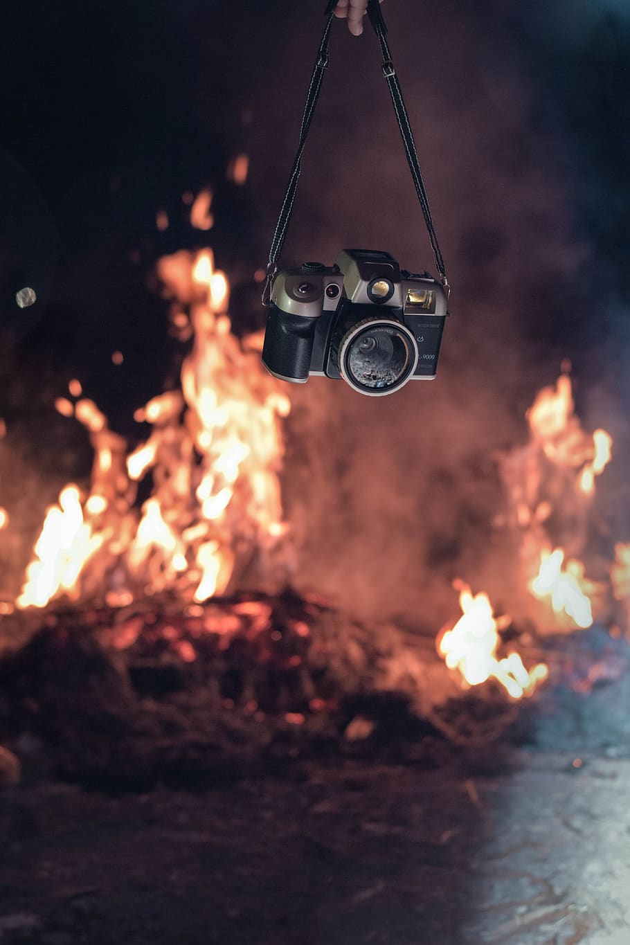 Person Holding Black and Grey Camera Near Fire, ash, blaze, blur HD wallpaper