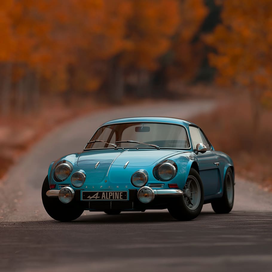 Shallow Focus Photography of Blue Alpine Car, action, asphalt HD wallpaper