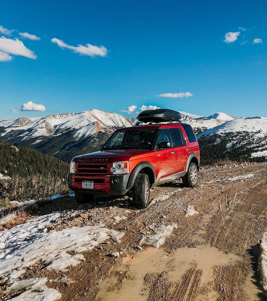 red Land Rover SUV, mountain, nature, snow, mode of transportation HD wallpaper