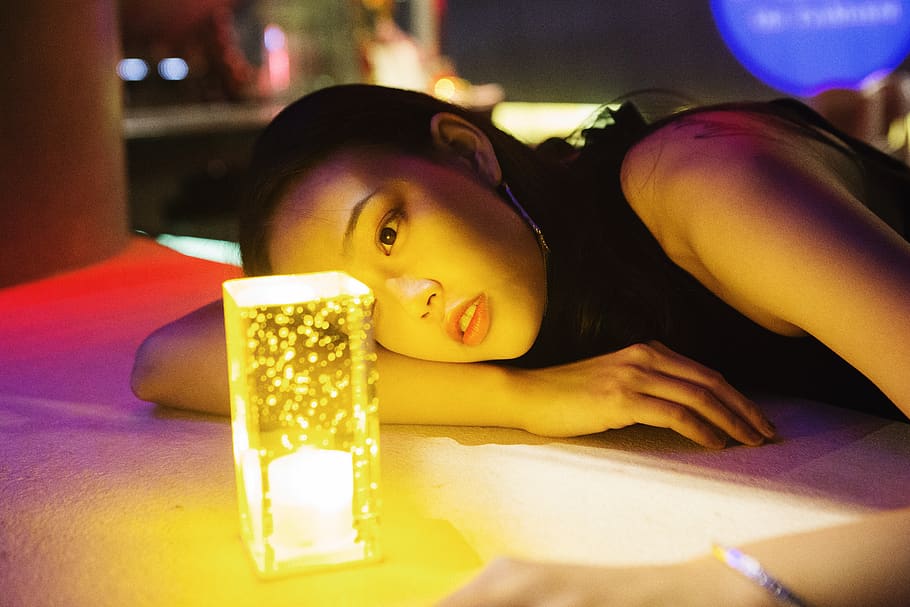 woman looking at yellow lamp, human, person, guangzhou, china