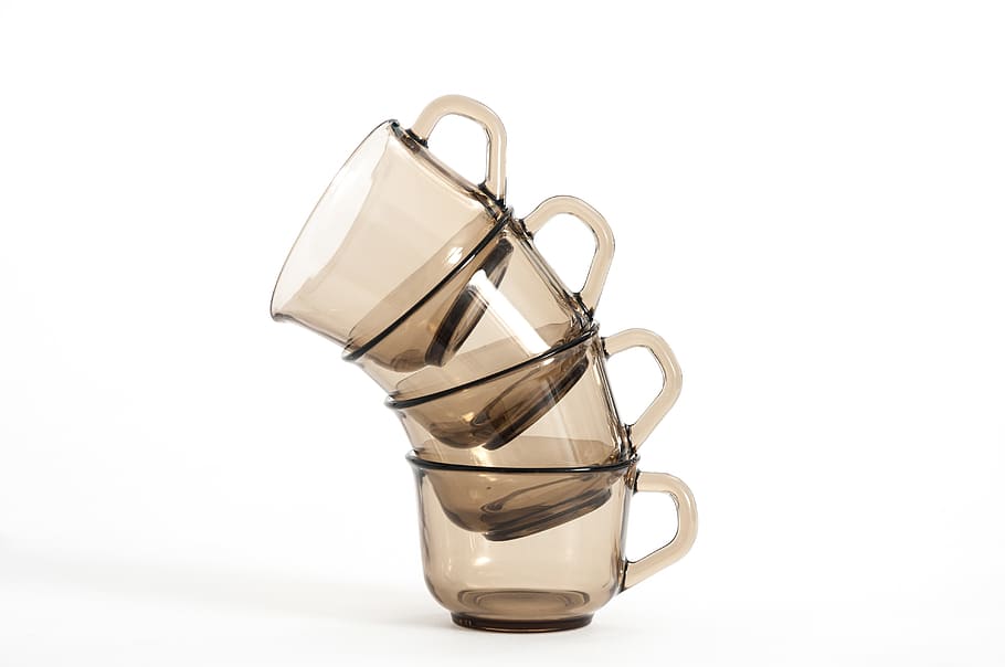 four clear glass cups, white background, studio shot, indoors HD wallpaper