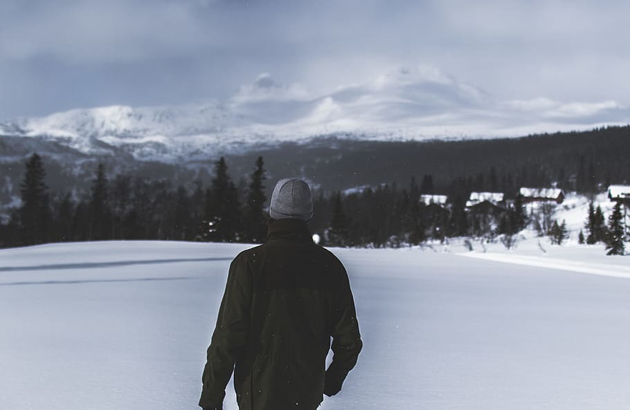 Man Wearing Black Jacket Walking in the Snow, clouds, cold, colors HD wallpaper