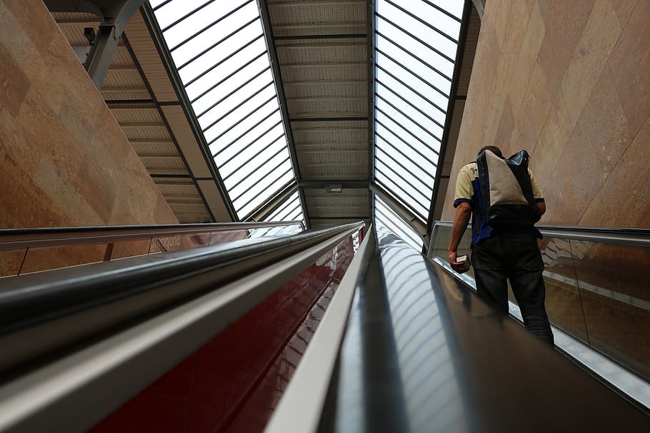 person on stairs inside building, architecture, window, human HD wallpaper