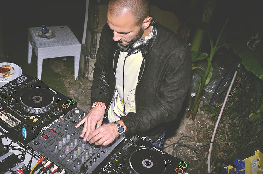 man using DJ audio mixer at night, music, one person, arts culture and entertainment HD wallpaper