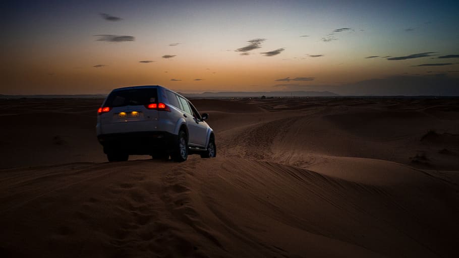 white SUV on desert during daytime, soil, outdoors, nature, merzouga