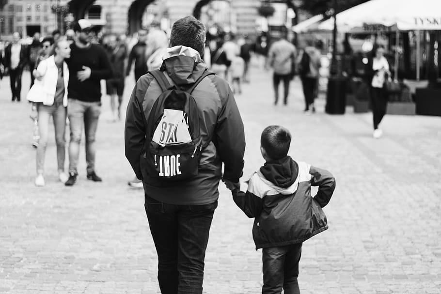 Grayscale Photography of Boy Holding Hand of Man, backpack, blur HD wallpaper