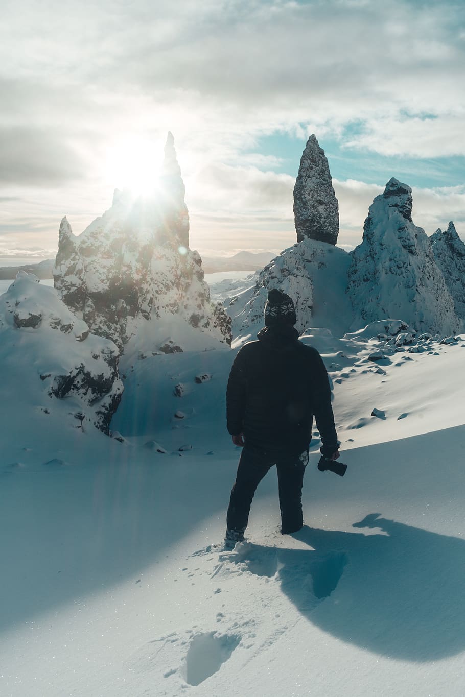man standing on snow ground while wearing black jacket, nature HD wallpaper