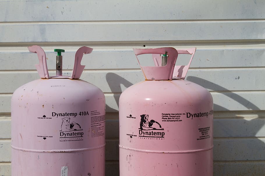 two pink Dynatemp propain tank, bottle, lotion, shampoo, grey HD wallpaper
