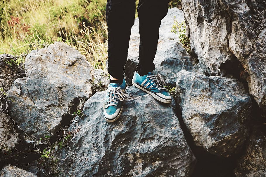 Person Standing on Gray Rock, adidas, black, blue, daytime, grass HD wallpaper
