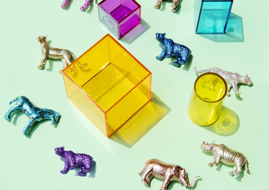 Assorted-color Animal Figurines Near Container, animals, boxes HD wallpaper