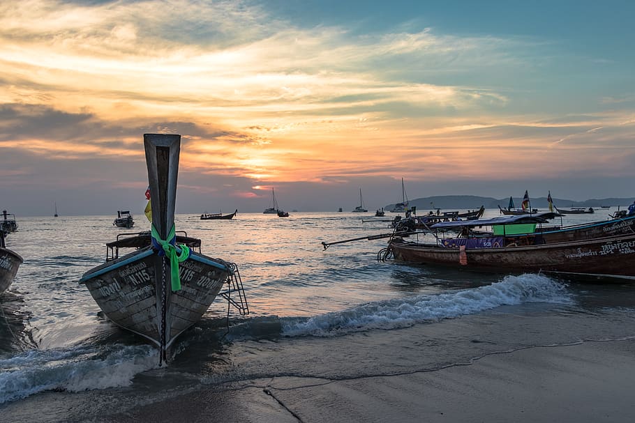 Brown Boat Near Body of Water during Sunset, beach, boats, clouds HD wallpaper