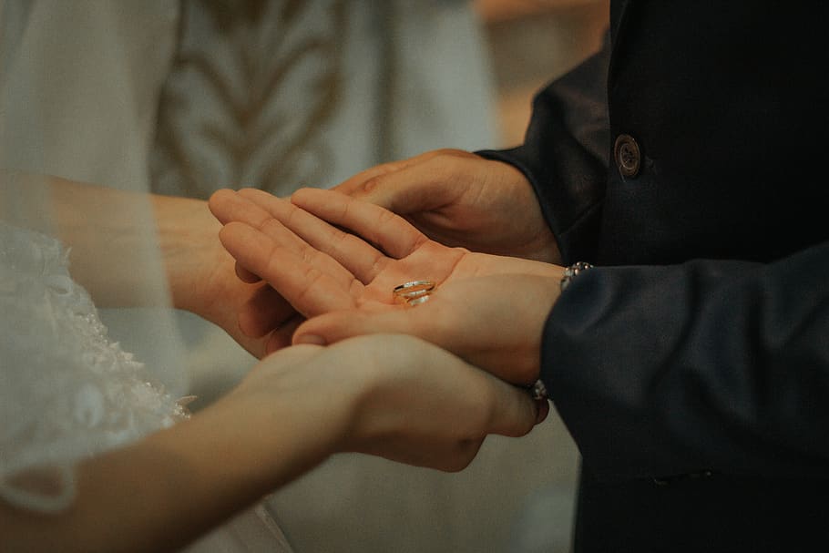 man and woman holding hands with ring on hand, finger, person, HD wallpaper