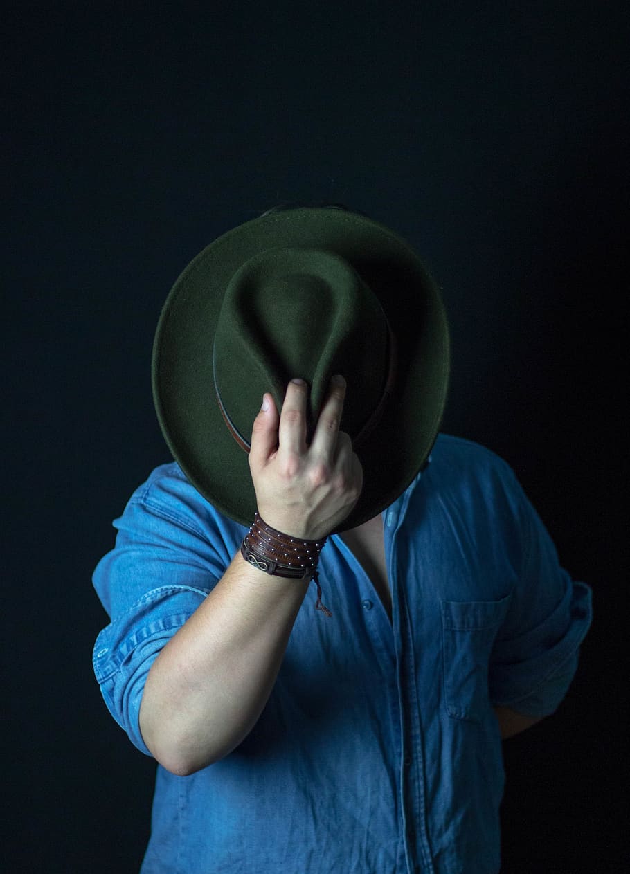 Person Holding Green Cowboy Hat, guy, hand, man, wear, one person HD wallpaper