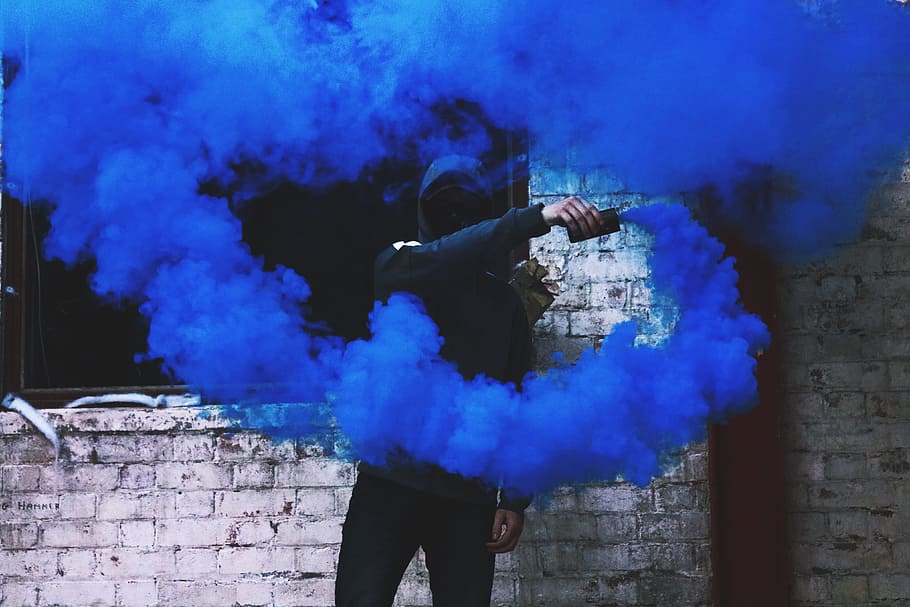Man with Blue Flare, people, mood, moody, smoke, smoke - physical structure