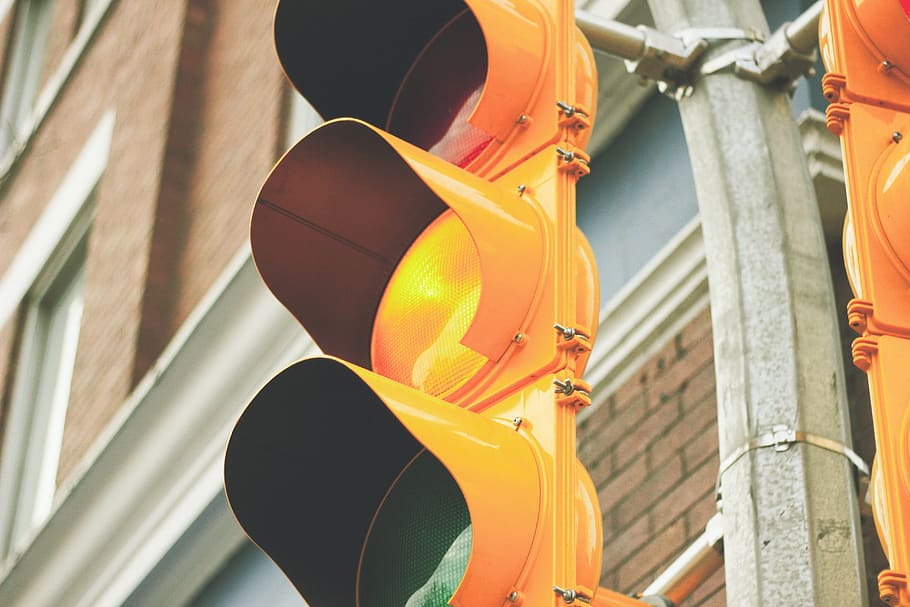 yellow painted traffic light, architecture, city, day, orange color HD wallpaper