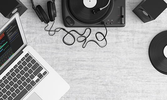 Macbook Pro Beside Black Headphones on Gray Table, devices, electronics HD wallpaper