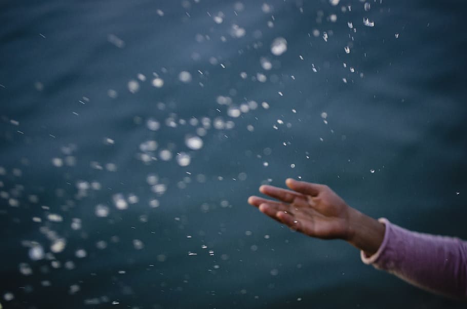 human body part, human hand, one person, rain, motion, water HD wallpaper