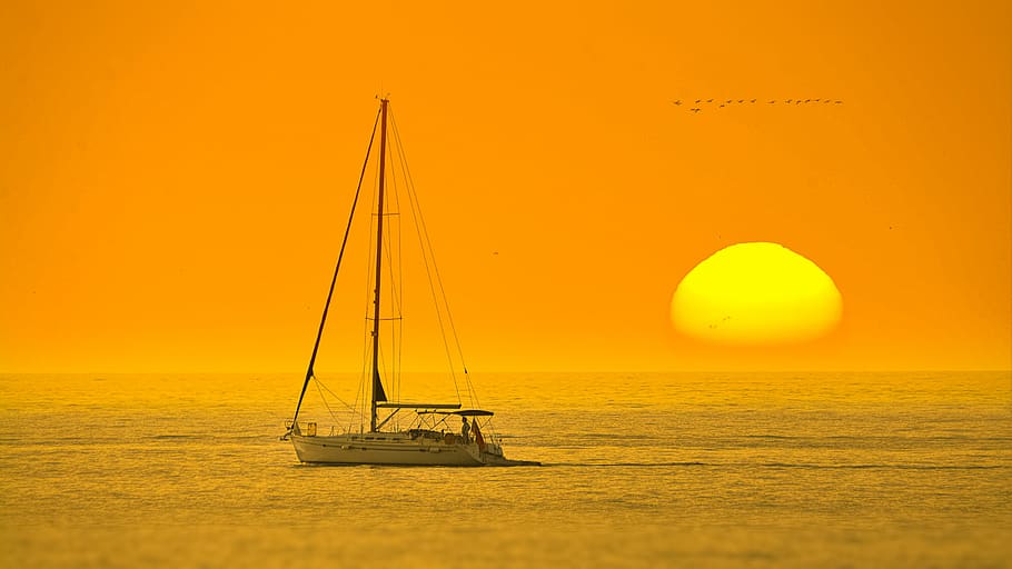 White Boat In The Middle Of The Sea During Sunset, backlit, dawn HD wallpaper