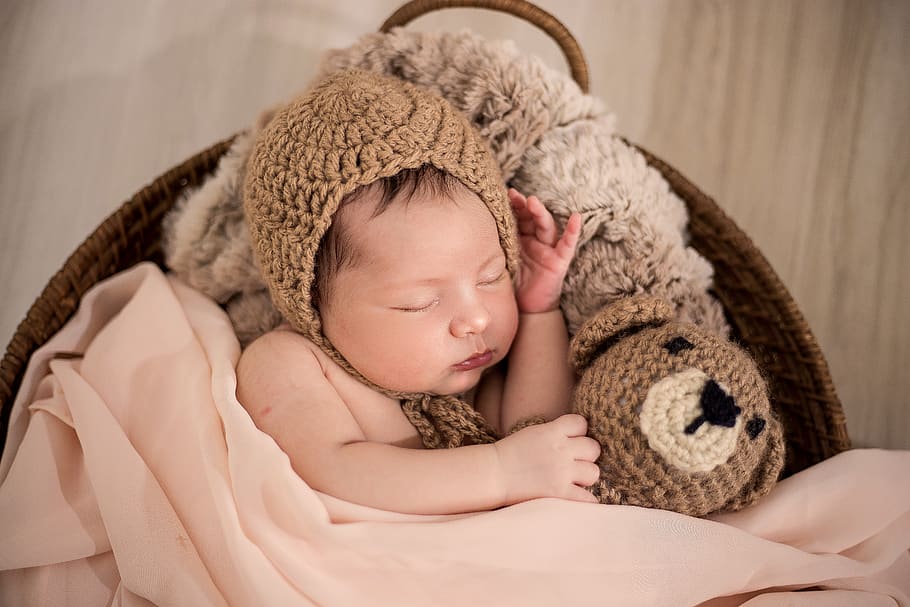 Baby Wearing Brown Knit Cap While Sleeping, adorable, blanket