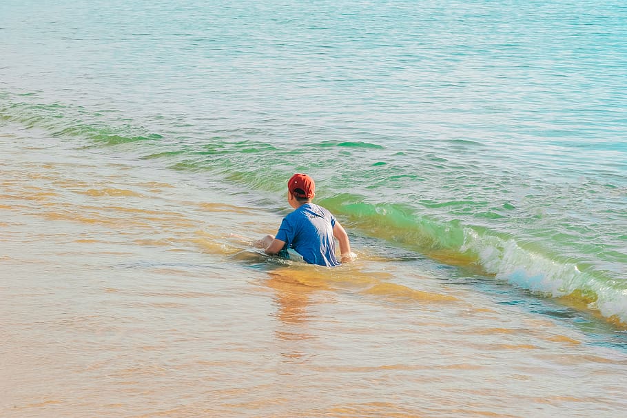 Photo of Boy Sitting on Shore at the Beach, child, fun, kid, leisure HD wallpaper