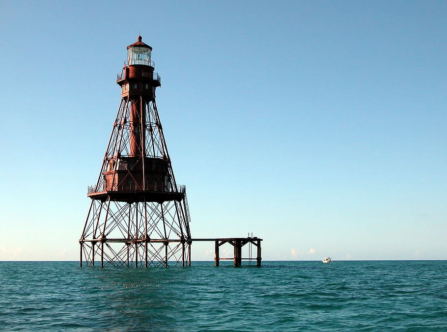 Lighthouse on Ocean, beacon, floating, sea, water, sky, architecture HD wallpaper