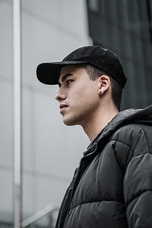 man in black bubble jacket, apparel, clothing, person, hat, human HD wallpaper