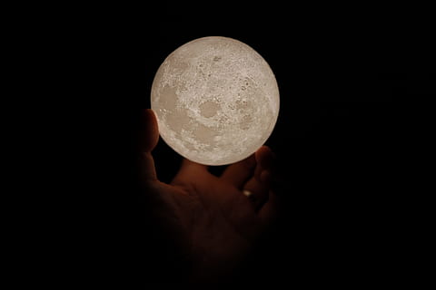 person holding white moon lamp, light, hand, mini, planet, circle HD wallpaper