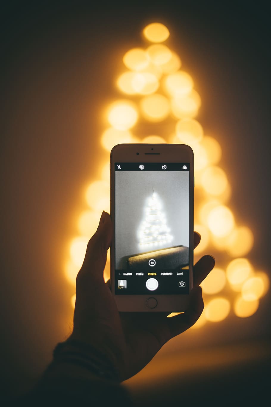 light, hygge, iphone, christmas tree, human hand, technology