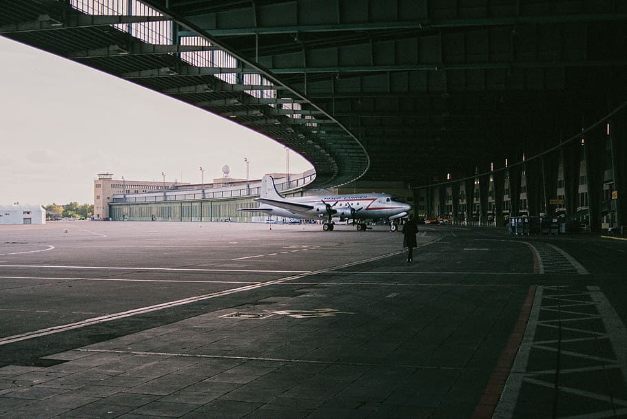 person standing on sidewalk at daytime, human, airport, aircraft, HD wallpaper