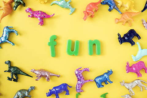 Assorted-animal Figurine Lot on Yellow Surface, alphabets, animals HD wallpaper