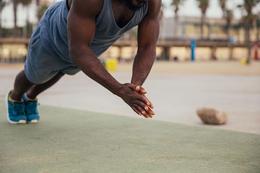 Clapping push-up exercise by a young african man outdoors, 25-30 year old, HD wallpaper