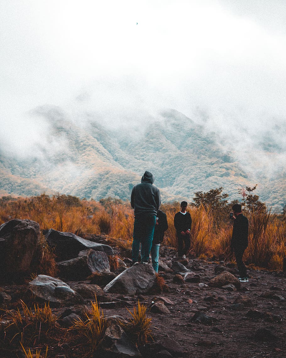 Group of People Near Foggy Mountain, adventure, boulders, cold HD wallpaper