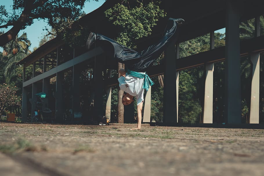 Person Doing Handstand, action, blur, costume, daylight, depth of field HD wallpaper