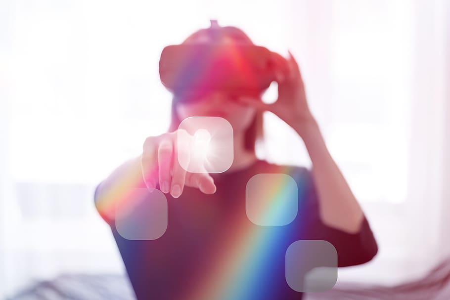 Woman wearing virtual reality goggles in her modern studio, human body part HD wallpaper
