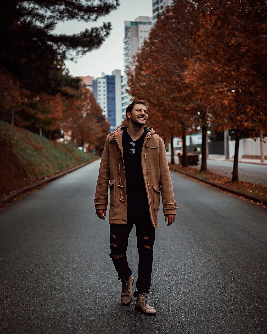 Smiling Man Walking Alone on Pathway, autumn leaves, casual, city