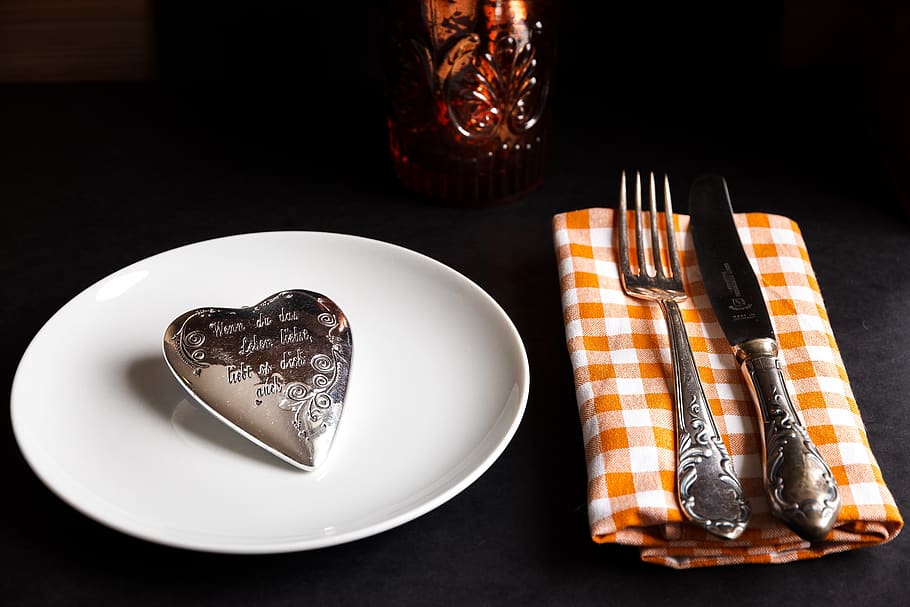 Product Photography of Silver Heart Accessory White Ceramic Plate and Fork and Steak Knife on White and Orange Handkerchief HD wallpaper